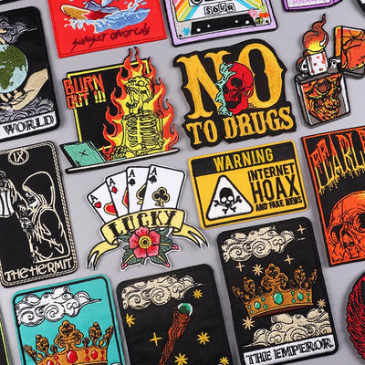 Collection of various colorful patches with different designs on a gray background