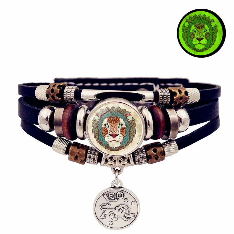 Multistrand bracelet with lion-themed charms on a white background