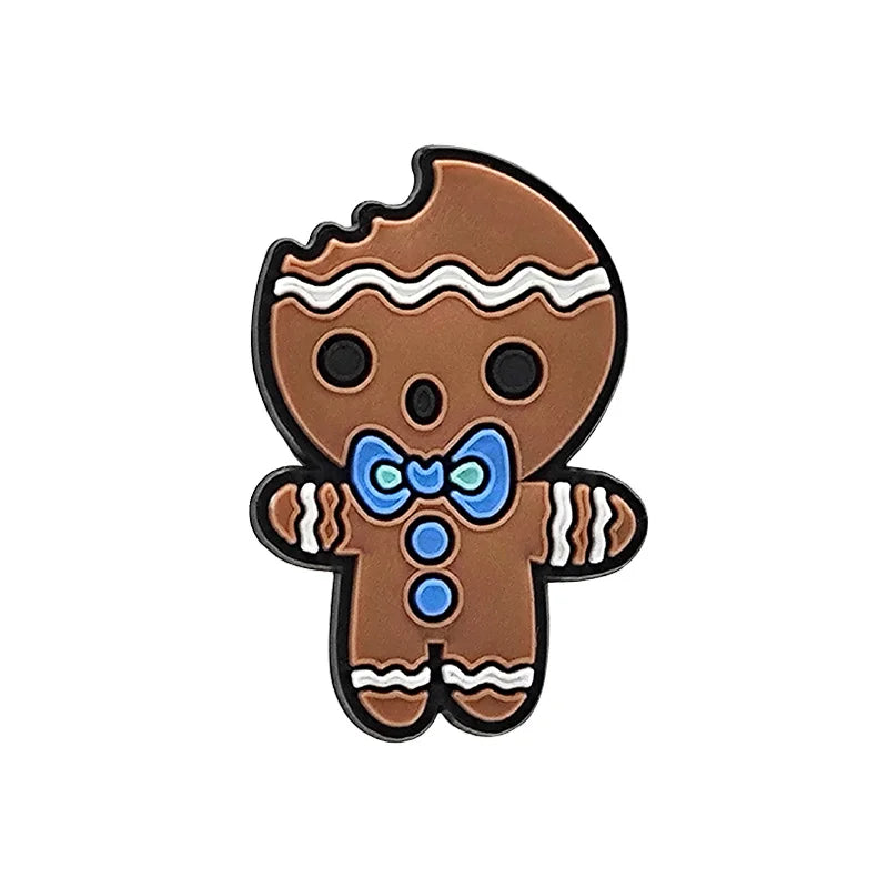 shoe charm ornament of Gingerbread man cookie charm with a blue bow tie on a white background