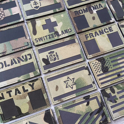 Collection of various national flags on camouflage backgrounds