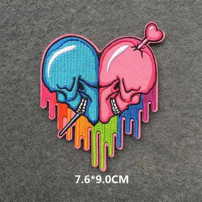 Colorful skull and heart design patch on a gray background