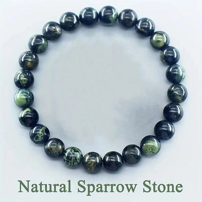 Bracelet made of natural sparrow stone beads on a white background