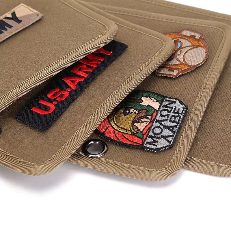 stack of Tactical patch display panels with some patches on them  