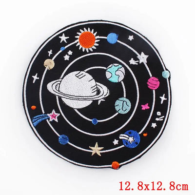 Embroidered patch with solar system design on a black background