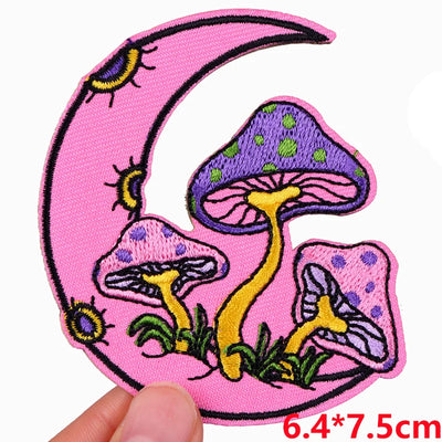 Patch with mushrooms and a pink crescent moon on a white background