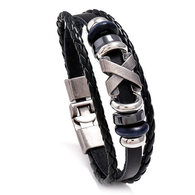 Black braided leather bracelet with silver and blue accents on a white background