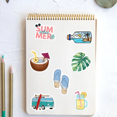 Sticker sheet with summer-themed designs on a notebook