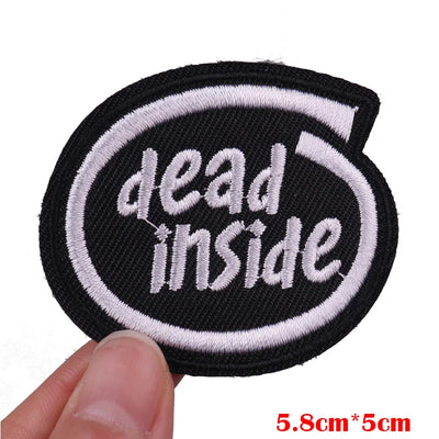Black and white patch with 'dead inside' text held by a hand, with size label '5.8cm*5cm'.