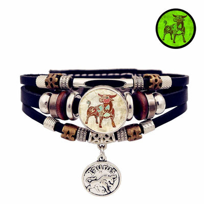 Multistrand bracelet with decorative elements and a pendant on a white background