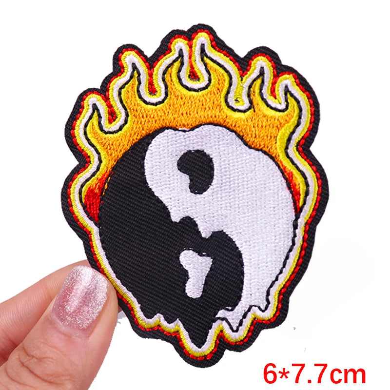 Flame-themed patch with a symbol held by a hand, size 6*7.7cm