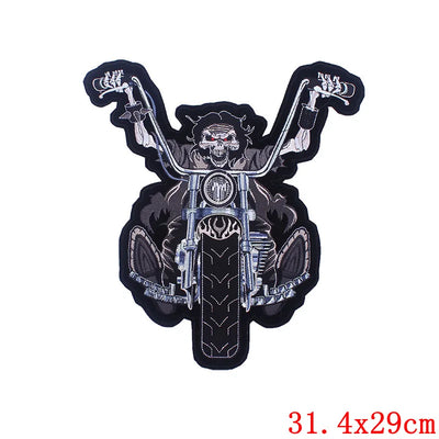 Motorcycle patch with a skull design on a white background