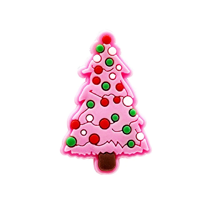 Shoe charm ornament of Pink Christmas tree-shaped object with red and green decorations on a white background