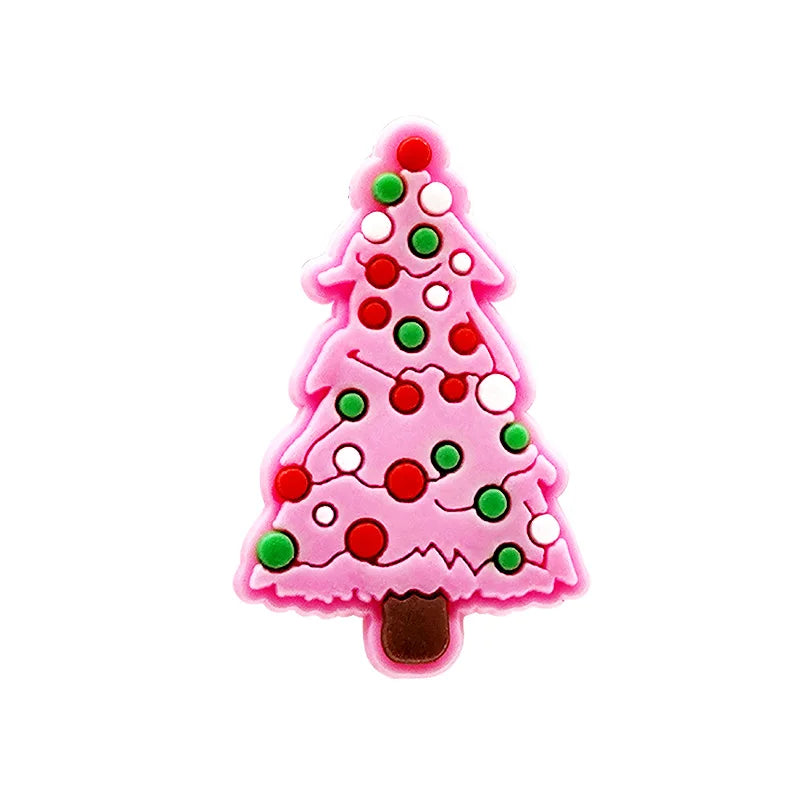 Shoe charm ornament of Pink Christmas tree-shaped object with red and green decorations on a white background