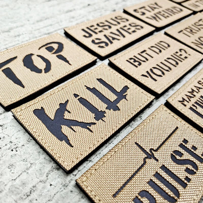 Set of doormats with various text and graphics on a textured surface