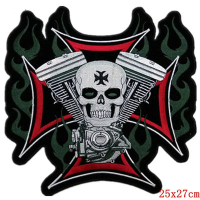 Motorcycle patch with skull and engine design on flames, brand 'Prajna' visible.