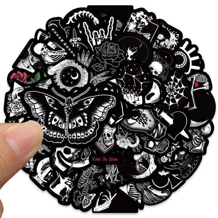 Sticker pack with various black and white designs on a white background