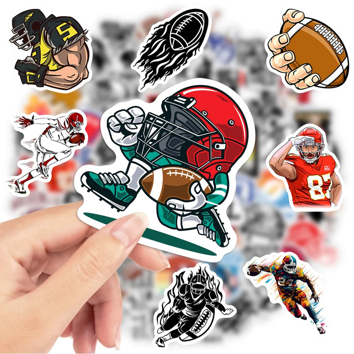 Collection of football-themed stickers held by a hand with a blurred sports background