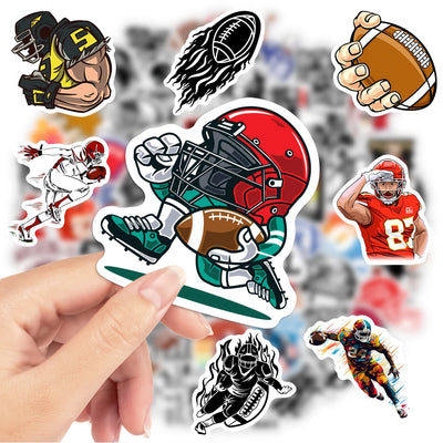 Collection of football-themed stickers held by a hand with a blurred sports background
