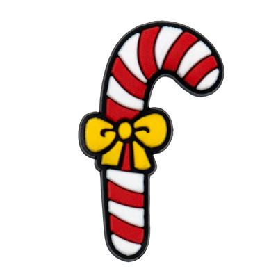 shoe charm ornament of Candy cane with a yellow bow on a white background
