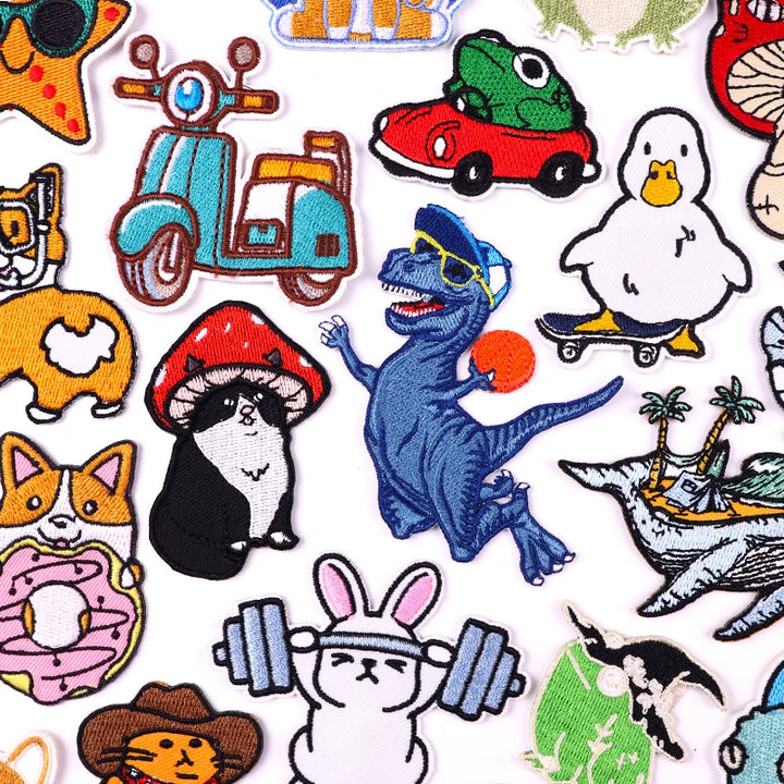 Collection of colorful cartoon-style patches featuring various animals and objects.