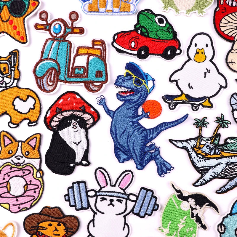 Collection of colorful cartoon-style patches featuring various animals and objects.