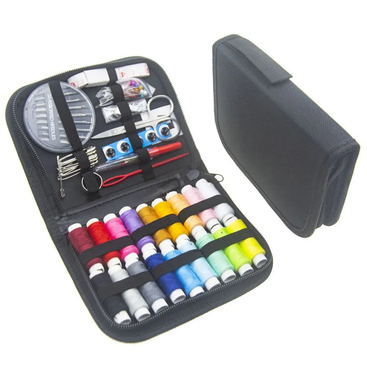 Sewing kit with colorful thread spools, scissors, and other tools in a black case.