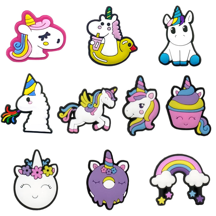 Collection of colorful unicorn-themed shoe charms on a white background