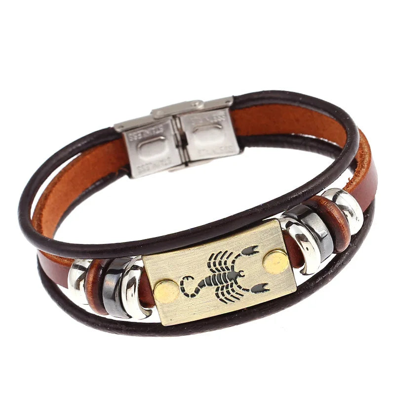 Bracelet with leather strap, metal clasp, and Scorpio symbol on a white background