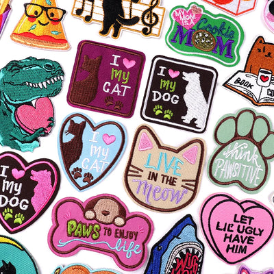Collection of colorful patches with various designs and text on a white background