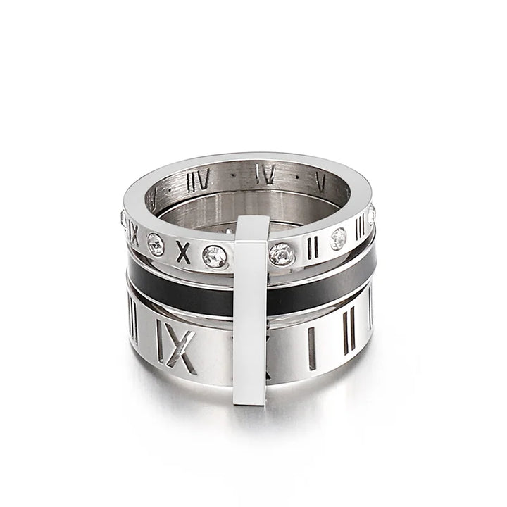 Silver ring with Roman numeral design on a white background