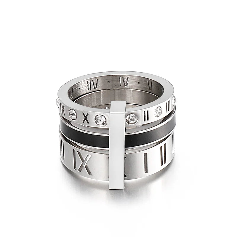 Silver ring with Roman numeral design on a white background