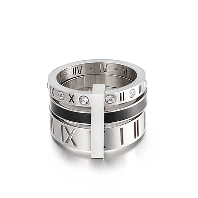 Silver ring with Roman numeral design on a white background