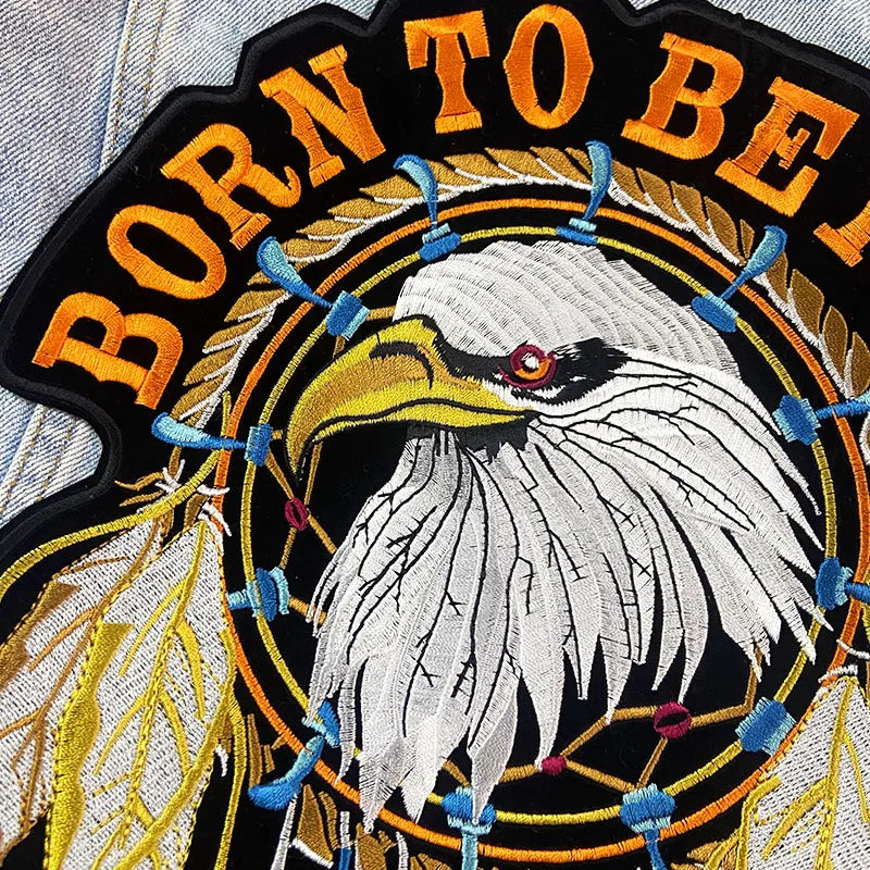 Embroidered patch with an eagle design and 'Born to Be' text on a black background