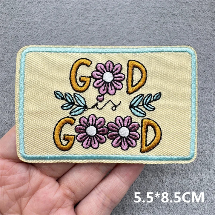 Embroidered patch with &