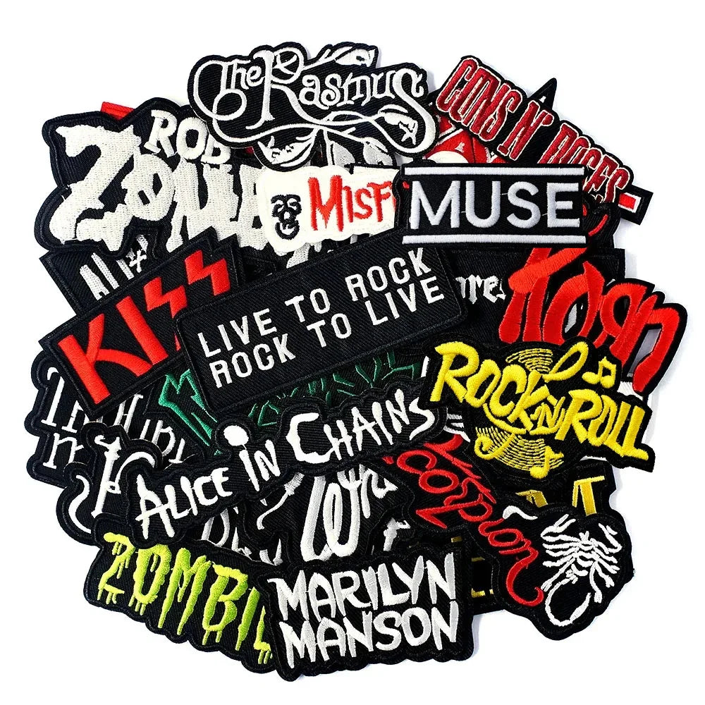 Music band patches including Kiss, Muse, and Marilyn Manson and others on a white background.
