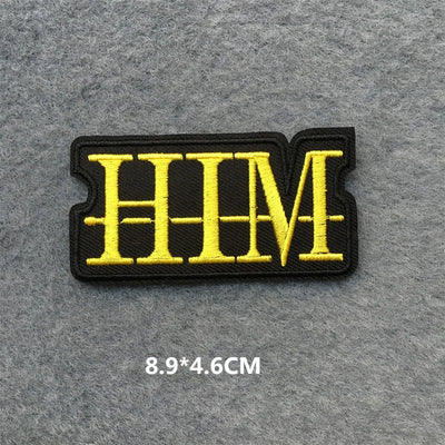 Yellow 'HIM' patch on a gray background with dimensions displayed.