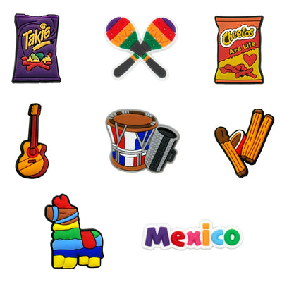 Collection of colorful Mexican-themed shoe charms including Takis chips, maracas, Cheetos, guitar, drum, accordion, and pinata on a white background.
