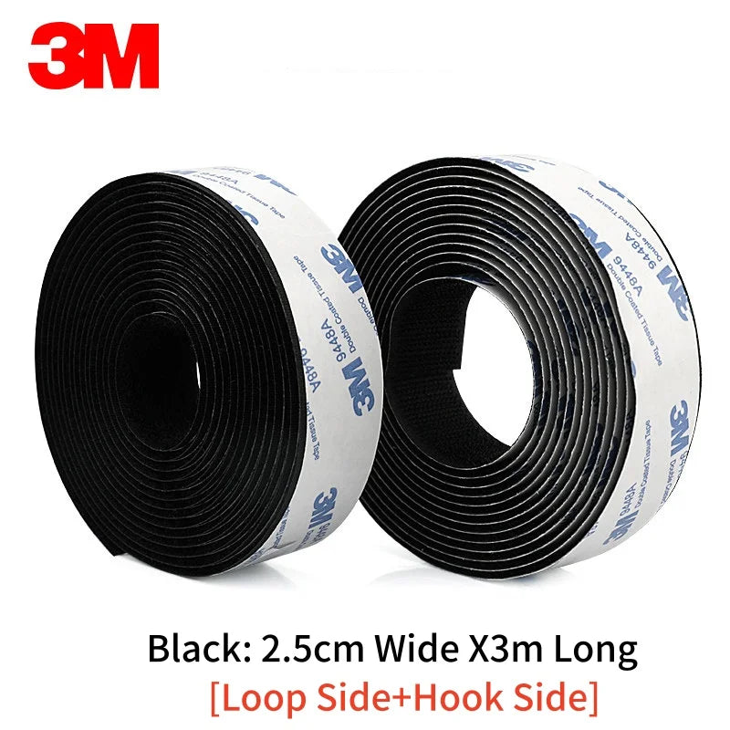 Two rolls of 3M black Velcro tape on a white background 2.5cm x 3 meters