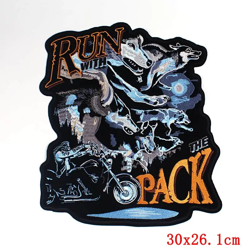 Sticker with wolves and a motorcycle, featuring the text 'Run with the Pack'.