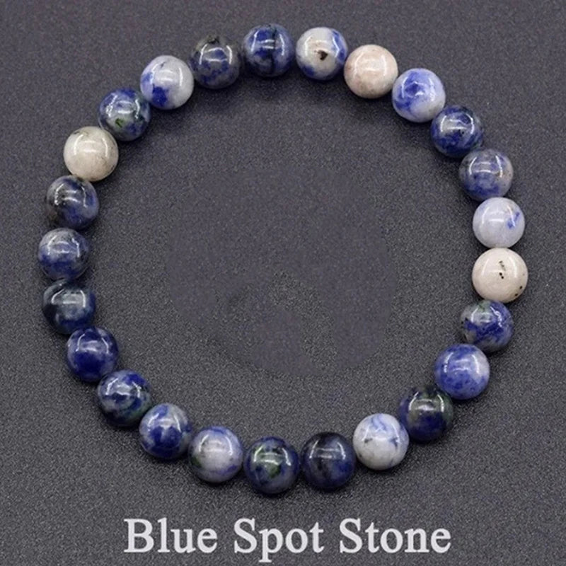 Bracelet made of blue and white beads on a dark background with 'Blue Spot Stone' text.