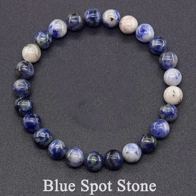 Bracelet made of blue and white beads on a dark background with 'Blue Spot Stone' text.