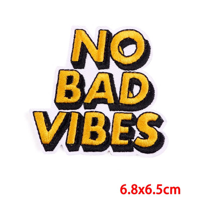 Embroidered patch with 'NO BAD VIBES' text on a white background