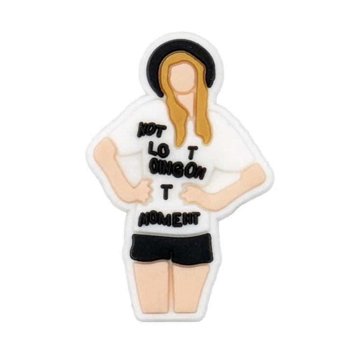 shoe charm of a person wearing a white shirt with text on a white background