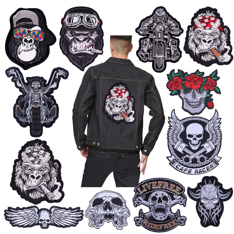 Man wearing a black jacket with a skull patch, surrounded by various other skull-themed patches on a white background.
