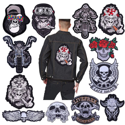 Man wearing a black jacket with a skull patch, surrounded by various other skull-themed patches on a white background.
