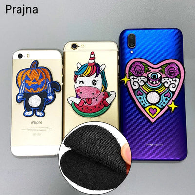 Three phone cases with colorful patches designs on a gray background, including a close-up of a velcro patch.