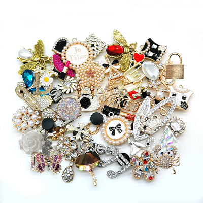 Assorted shoe charms on a white background