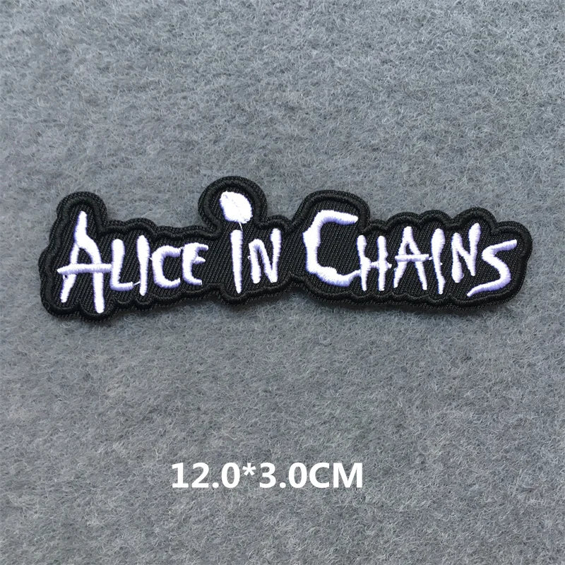 Embroidered patch with 'Alice in Chains' text on a gray background