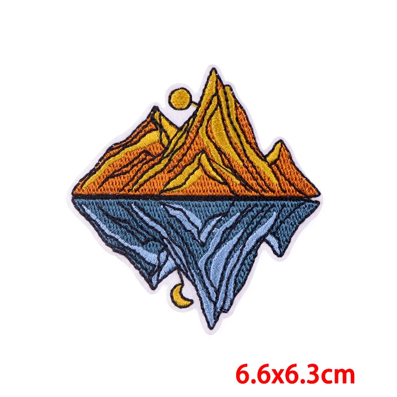 Mountain design patch with size label '6.6x6.3cm' on a white background