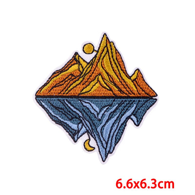 Mountain design patch with size label '6.6x6.3cm' on a white background